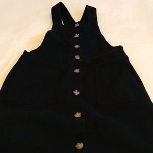 Black overall jean dress.